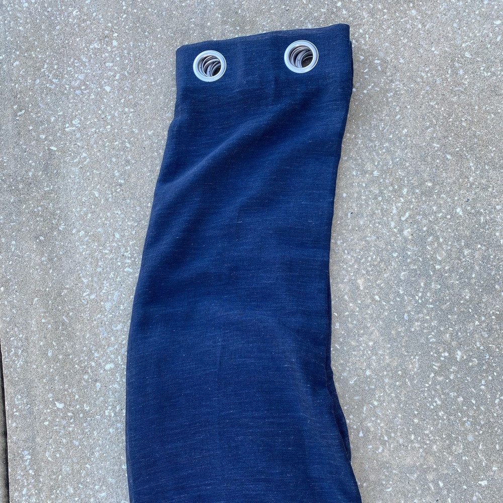 One pair of navy semi sheer drape panels